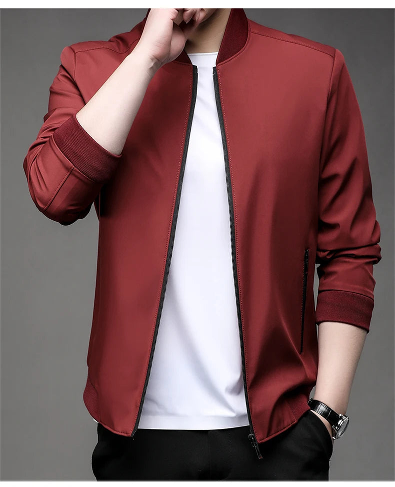 Red men's baseball collar jacket with ribbed collar and cuffs, worn over a white tee