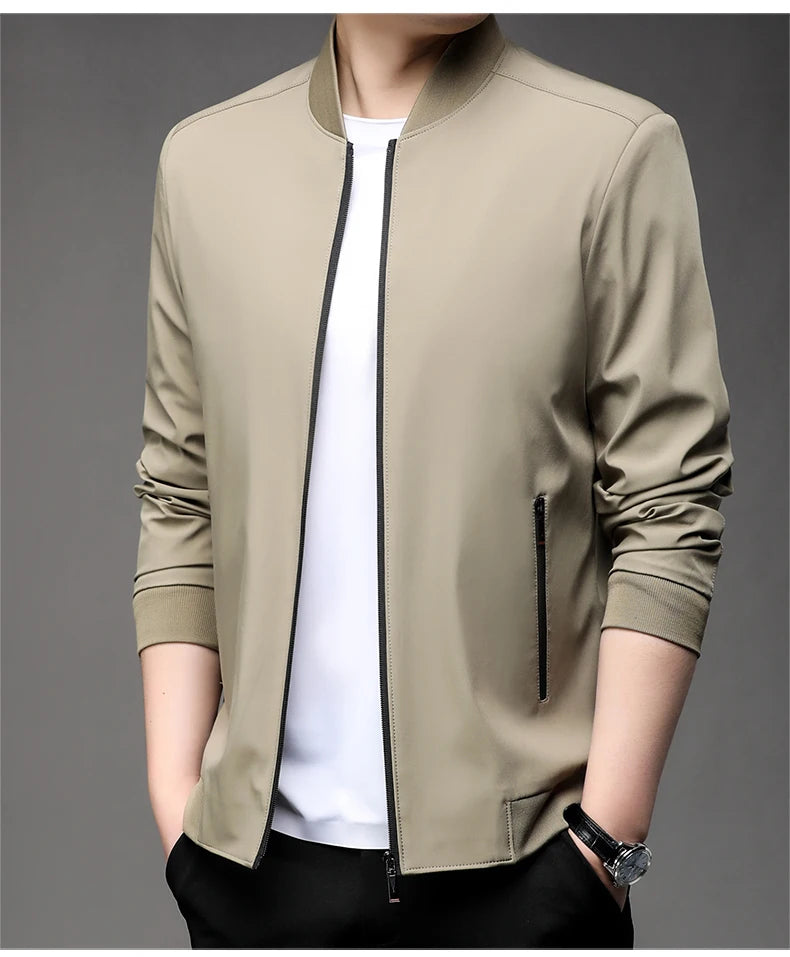Khaki men's baseball collar jacket worn open over a white tee