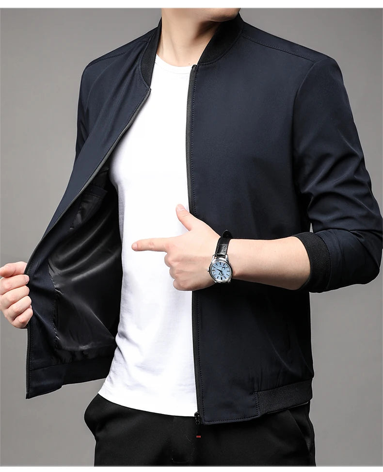 Navy blue men's baseball collar jacket worn open, showing the dark lining