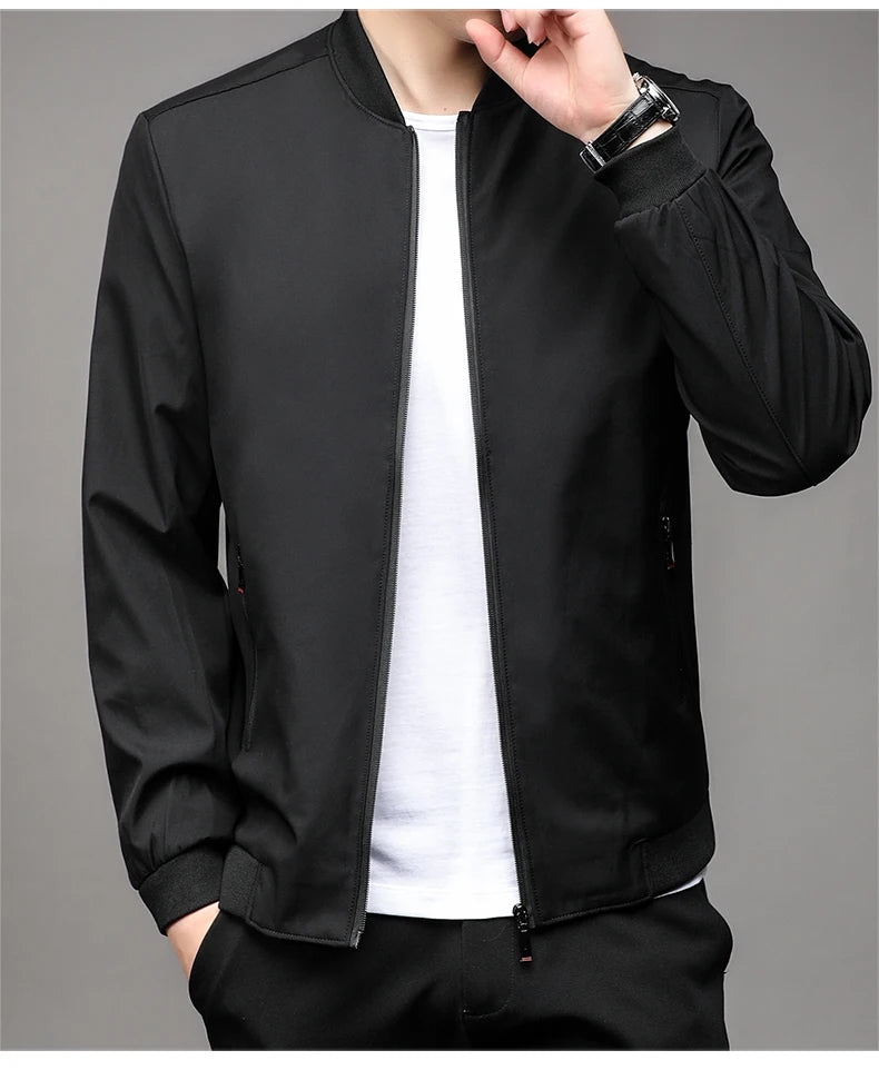 Black men's baseball collar jacket with ribbed collar, worn over a white tee