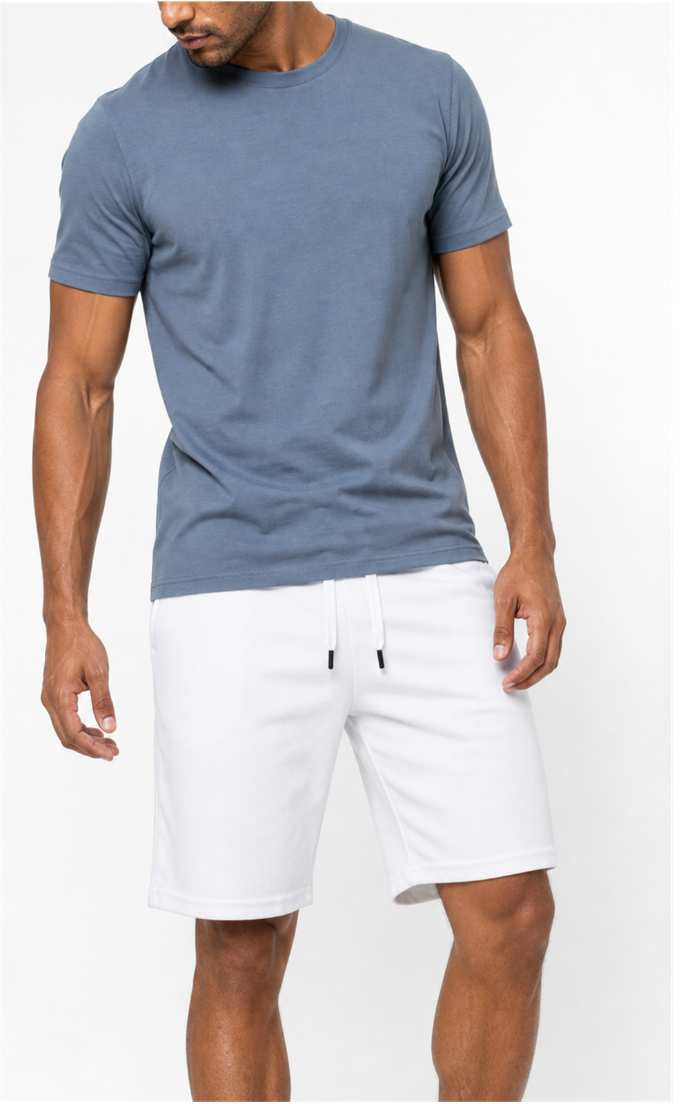 Model in blue-gray tee wearing white knit lounge shorts