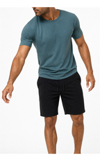 Model in teal tee wearing black knit lounge shorts
