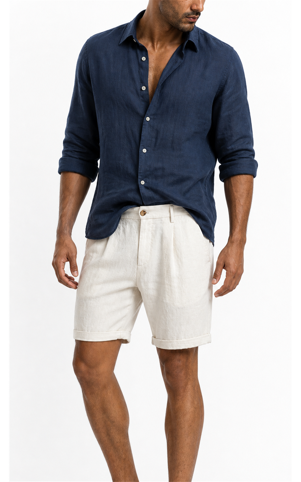 Model in navy linen shirt wearing off-white pleated linen blend shorts