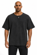 Man wearing the washed black henley with black trousers, full view