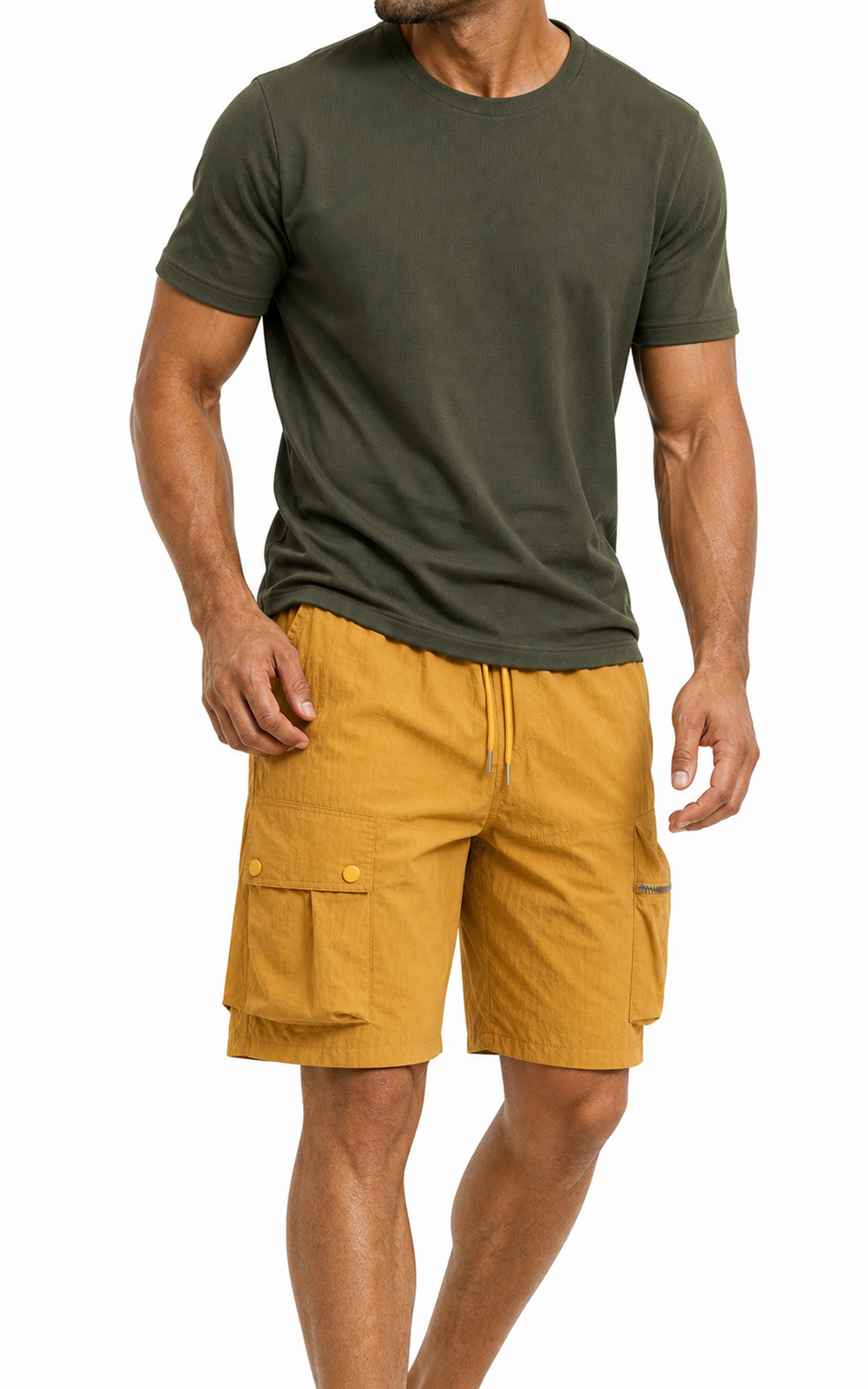 Man wearing MANLY yellow cargo shorts with olive tee — styled front look