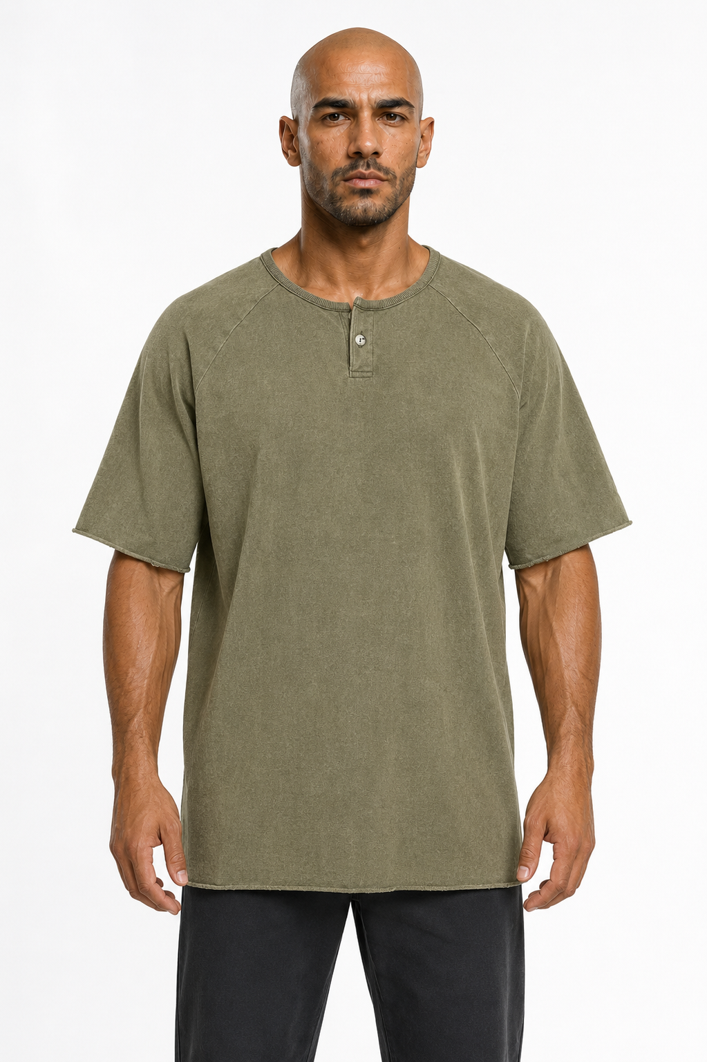 Man wearing the washed olive henley with black trousers, full view