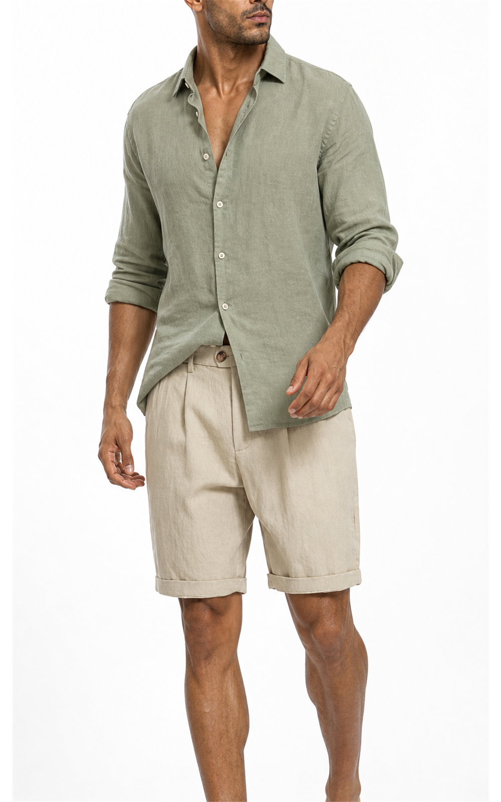 Model in sage green shirt wearing sand khaki pleated shorts