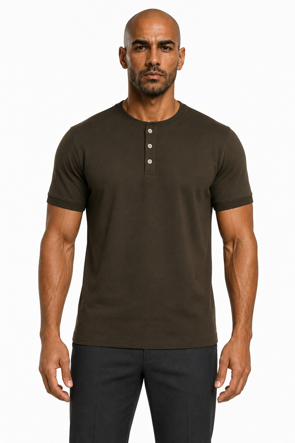 Man wearing the military green 3-button henley with dark trousers