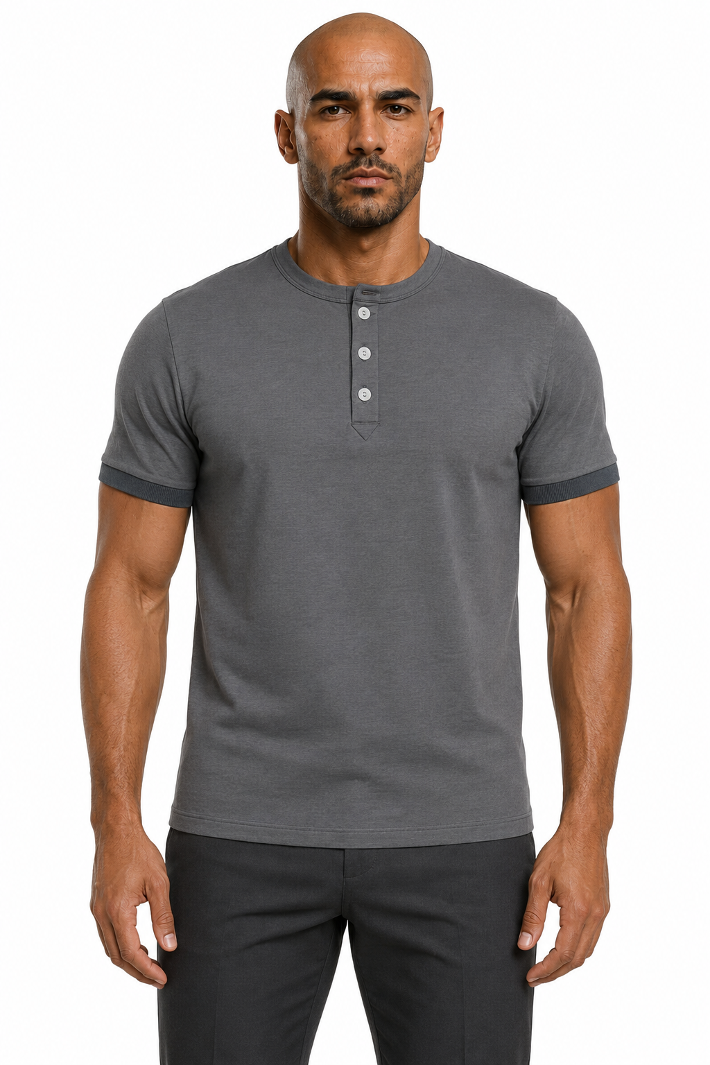 Man wearing the cold gray 3-button henley with dark trousers