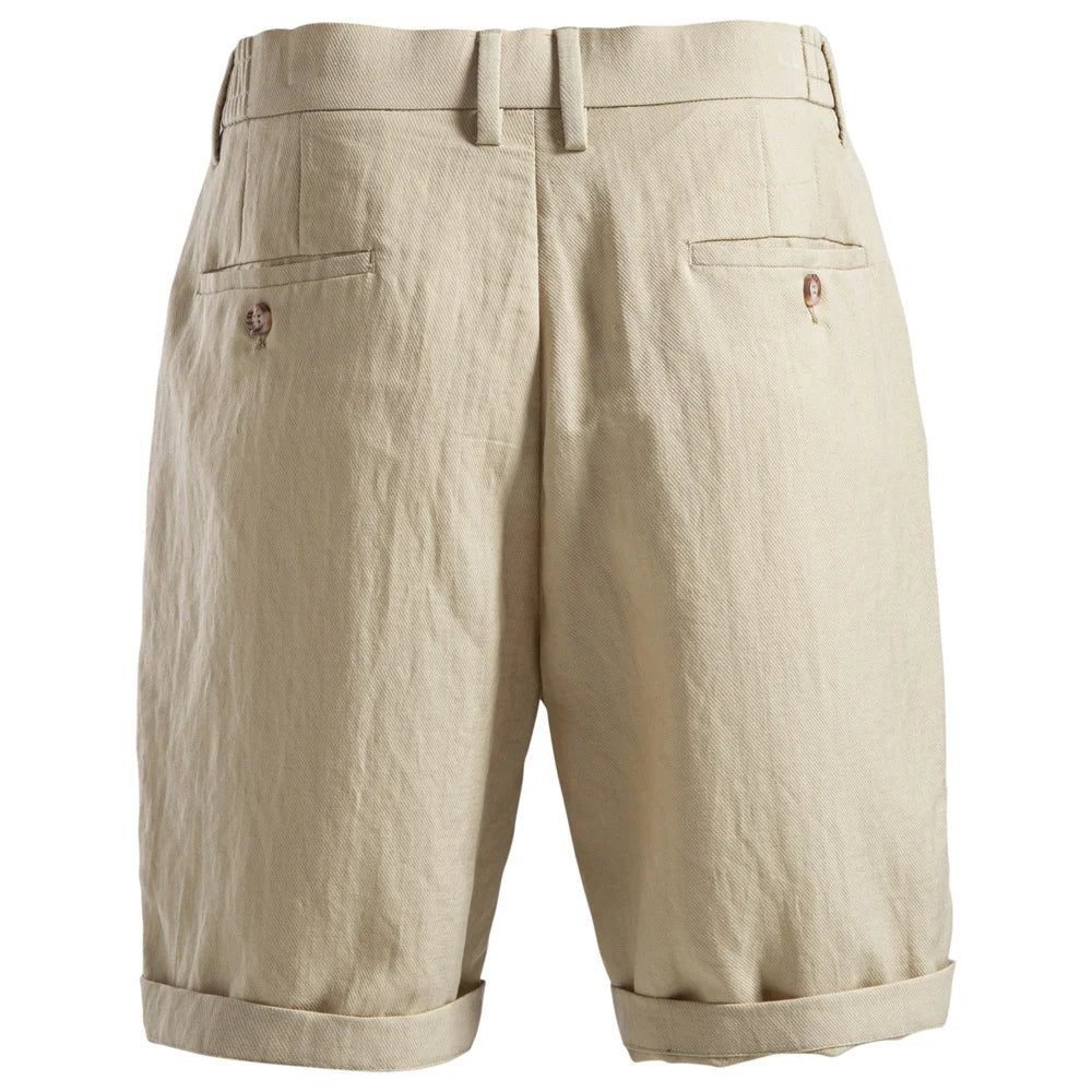 Back view of beige shorts with buttoned welt pockets and belt loops