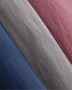 Crinkle fabric macro: navy, grey, burgundy