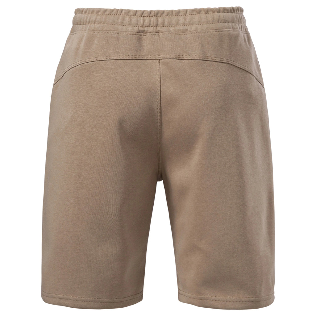 Back view of tan knit shorts with yoke seam and elastic waist