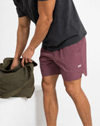 Burgundy retro shorts with ARMY embroidery — studio, olive tote