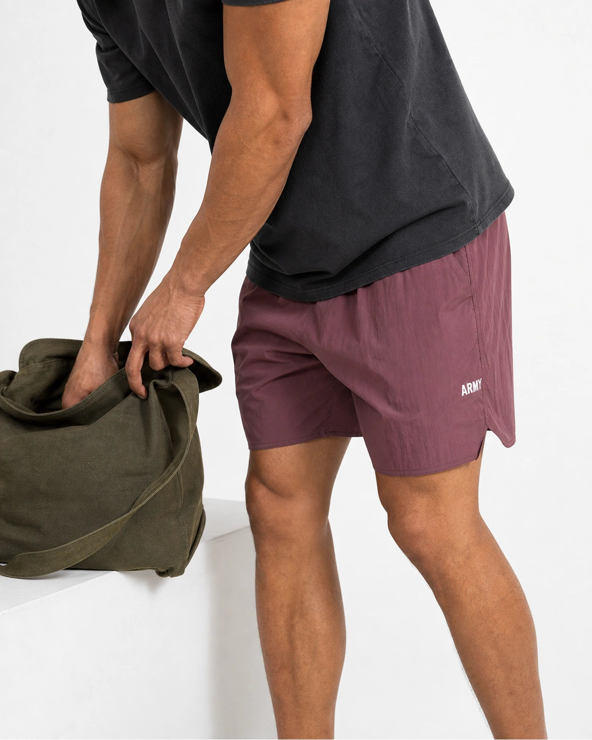 Burgundy retro shorts with ARMY embroidery — studio, olive tote