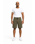 Full front: army green mesh shorts with white tee