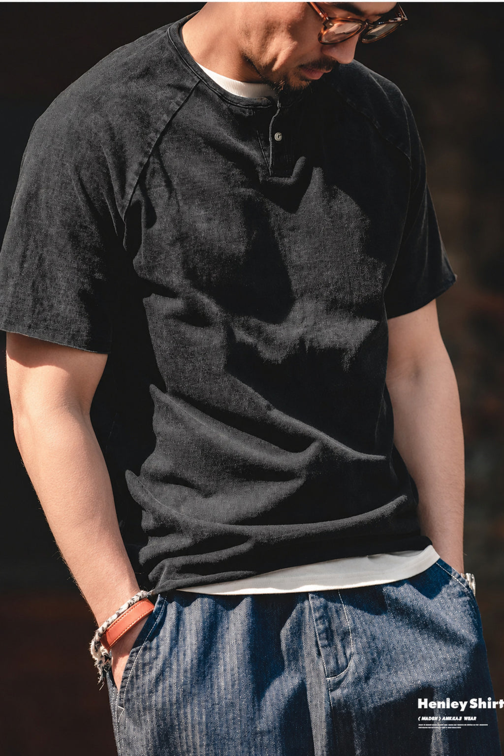 Front view of the washed black henley showing the short placket