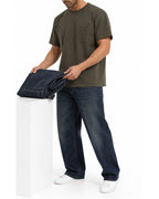 Man wearing the graphite green pocket tee with blue jeans, full view