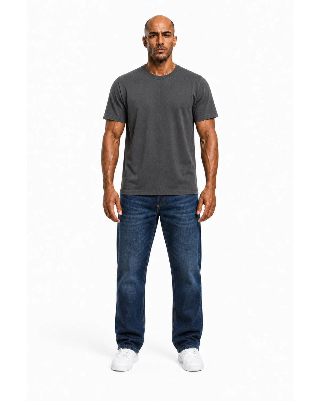Man wearing the grey heavyweight tee with blue jeans, full view