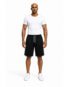 Full front: black mesh shorts with white tee
