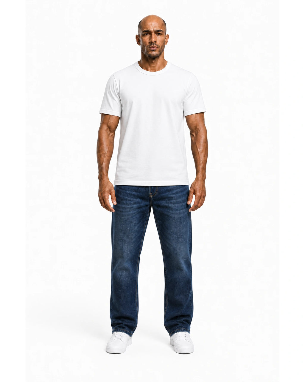 Man wearing the white heavyweight tee with blue jeans, full view