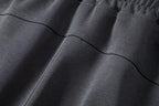 Back yoke seam detail on dark gray knit shorts