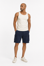 Full front: navy cargo sweat shorts with white tank