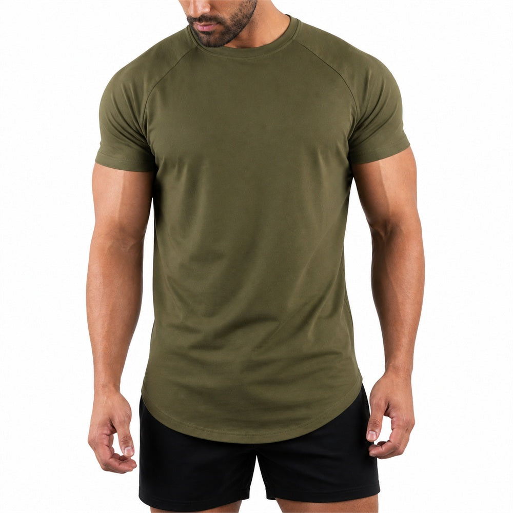 Man wearing the army green athletic gym tee with black shorts