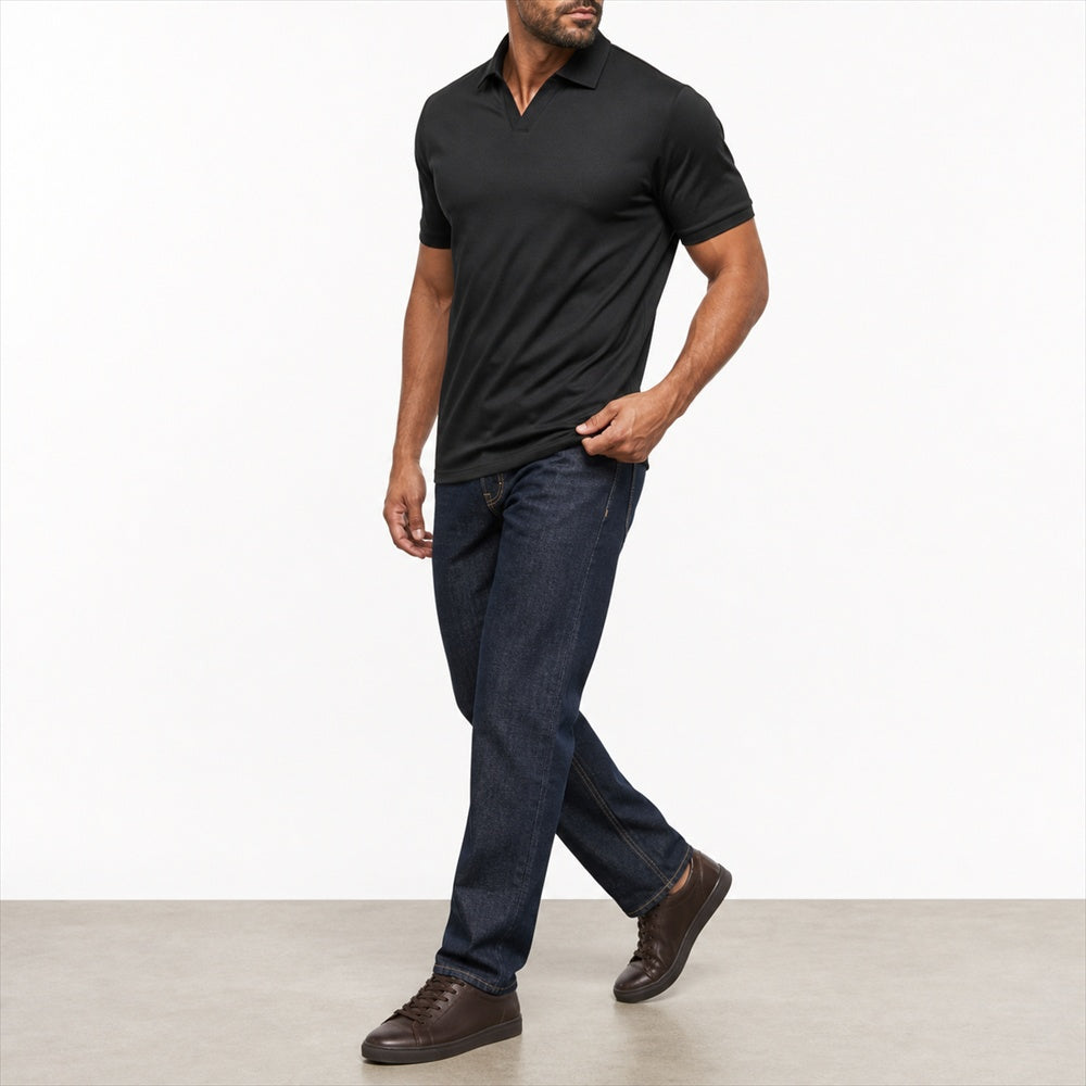 Man wearing the black open-collar polo with dark jeans