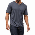 Man wearing the dark grey everyday henley with jeans
