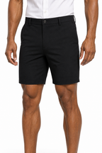 Black smart casual shorts on model, cuffed hem at the knee