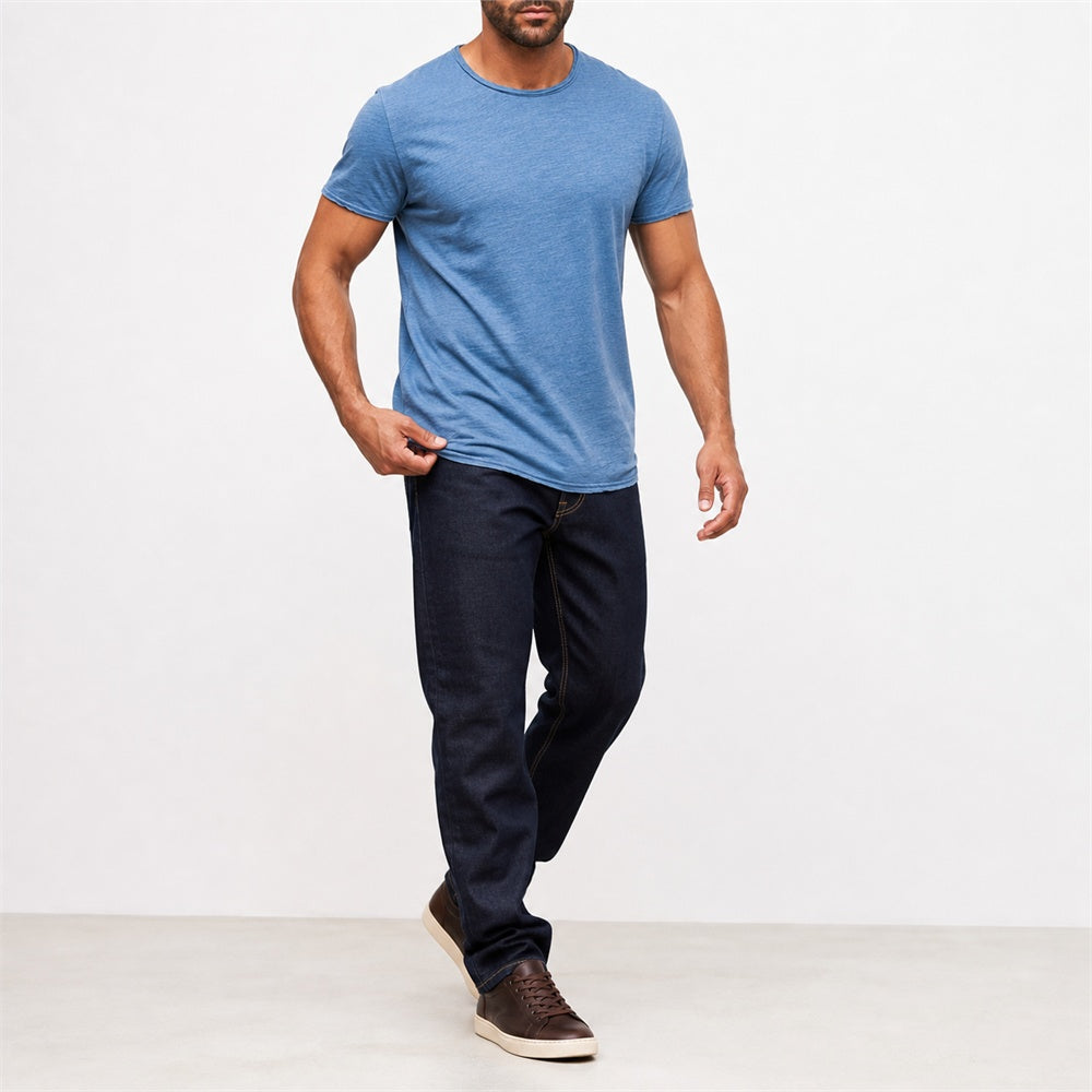 Man wearing the blue textured crew neck t-shirt with dark trousers