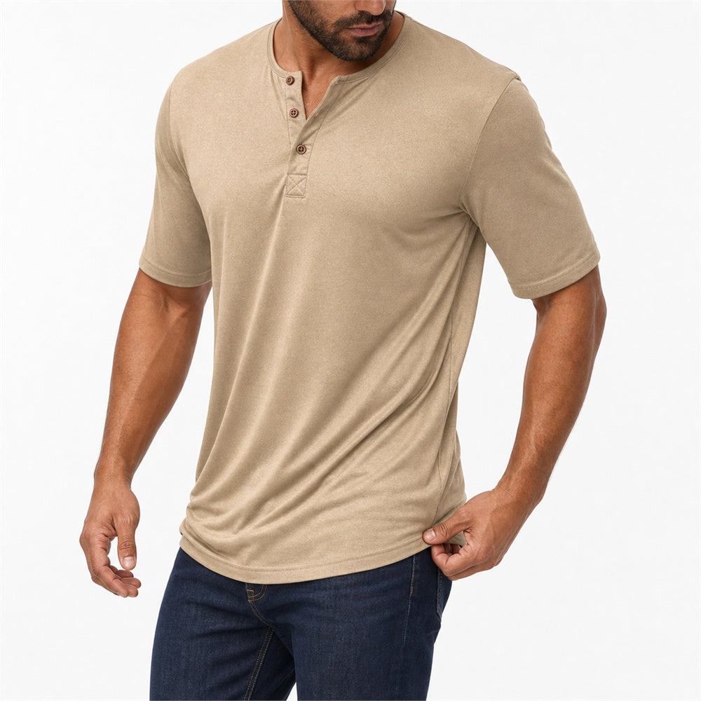Man wearing the khaki everyday henley with dark trousers