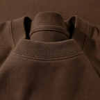 Close-up of the crew neckline on the Men's Plain Heavyweight Tee in Mocha Brown