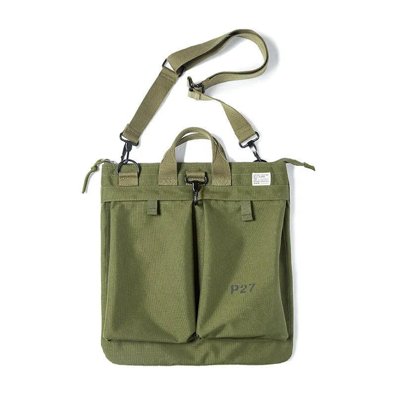 Military Green helmet messenger bag on white with the crossbody strap extended full length