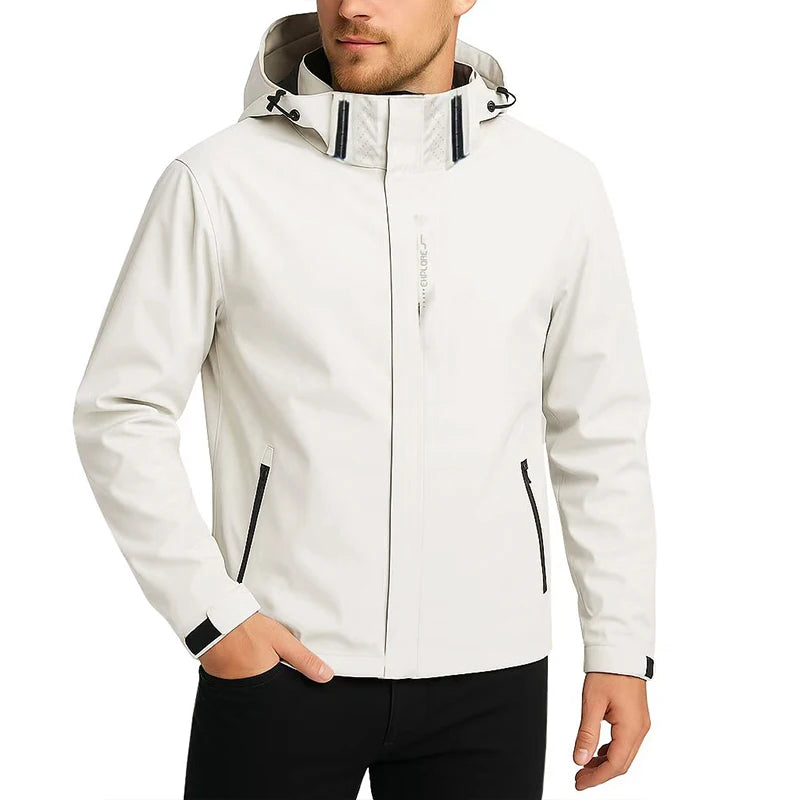 Man wearing the white waterproof windbreaker with hood