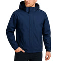 Man wearing the navy waterproof windbreaker with hood