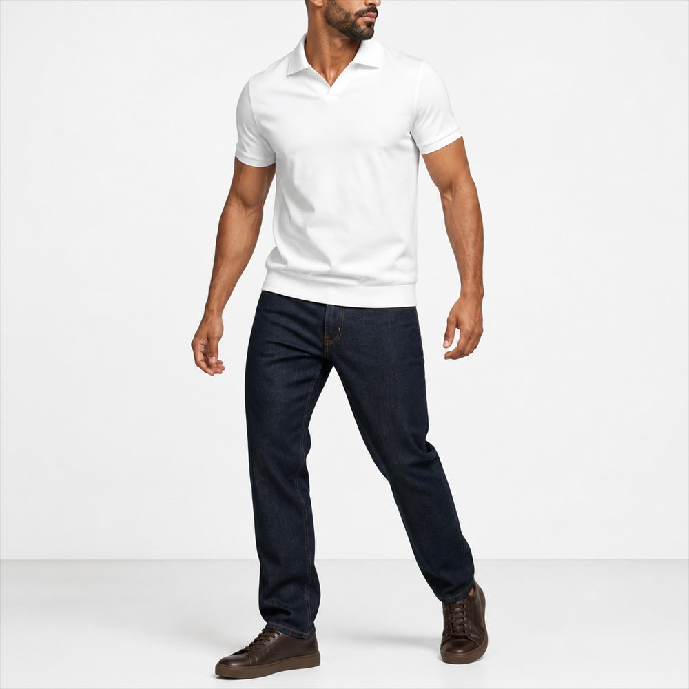 Man wearing the white open-collar polo with dark jeans
