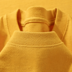 Close-up of the crew neckline on the Men's Plain Heavyweight Tee in Yellow