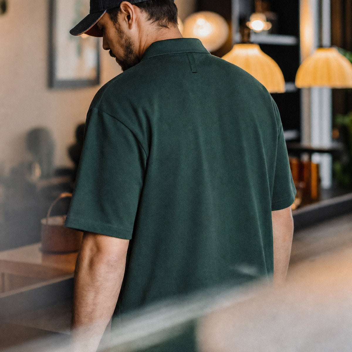 Back view of the forest green retro polo