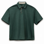 Forest green retro polo with contrast tape placket, flat front view