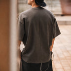 Back view of the coffee brown oversized tee with cap