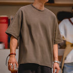 Front torso view of the coffee brown oversized boxy tee