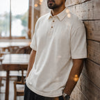 Man wearing the creamy white retro polo, casual scene