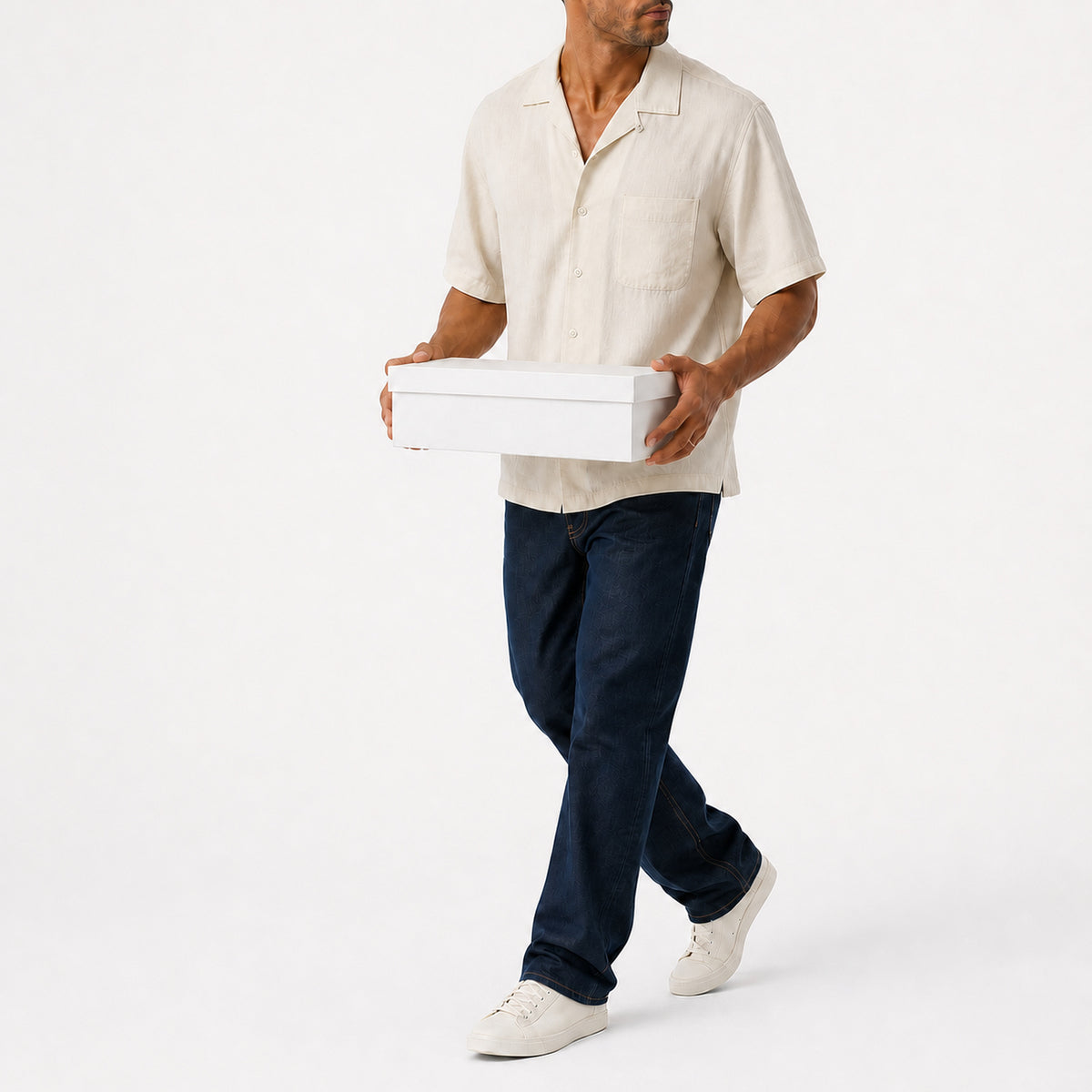 Man wearing the khaki lyocell camp shirt with navy trousers, full view