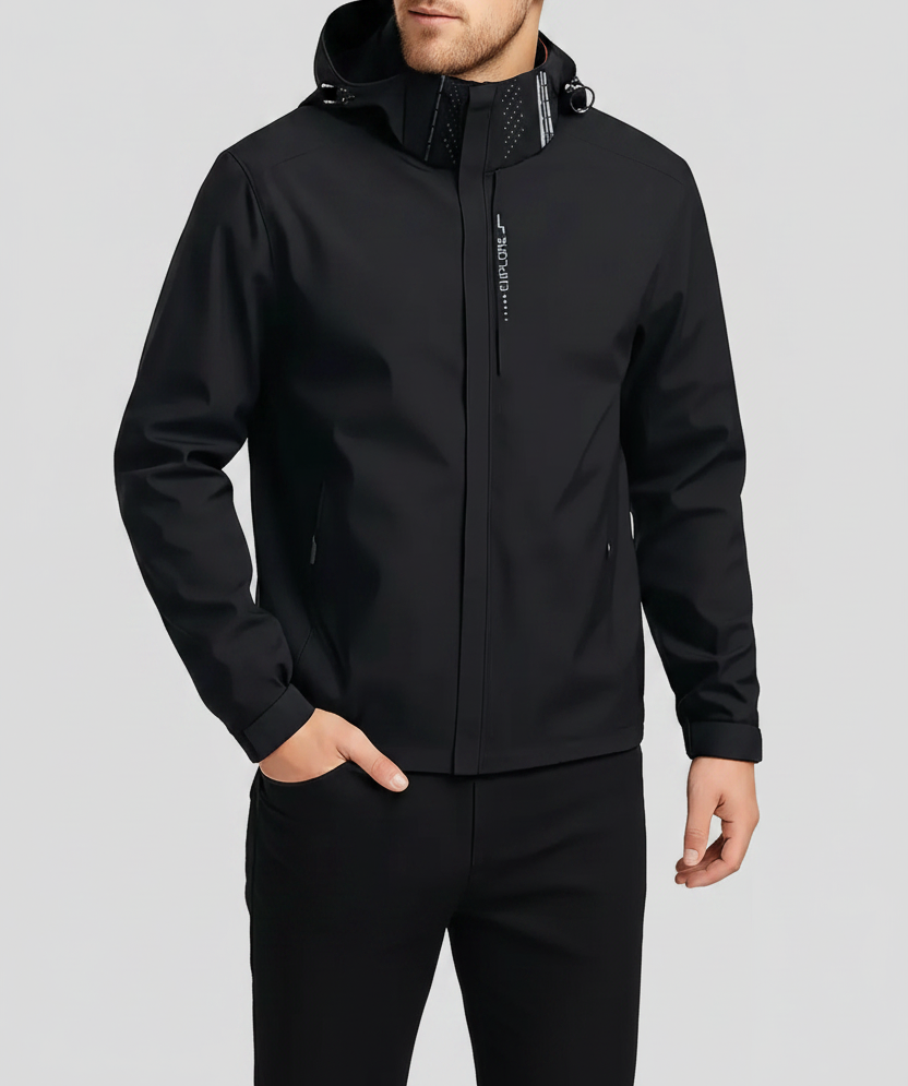 Man wearing the black waterproof windbreaker with hood, front view